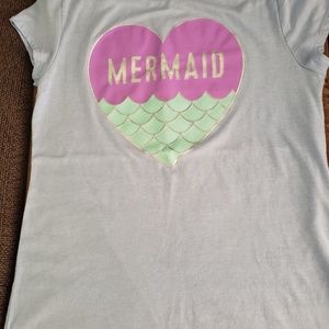 Children place shirt